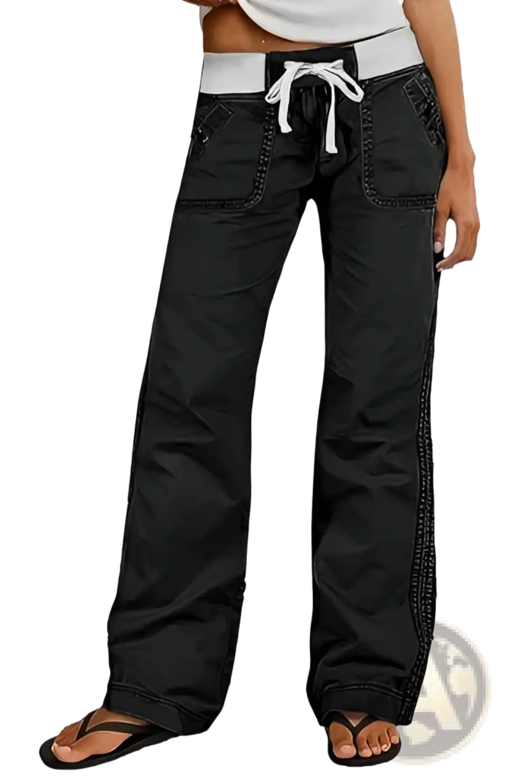Low waist black cargo jeans with white drawstring waistband and side pockets made of durable denim material