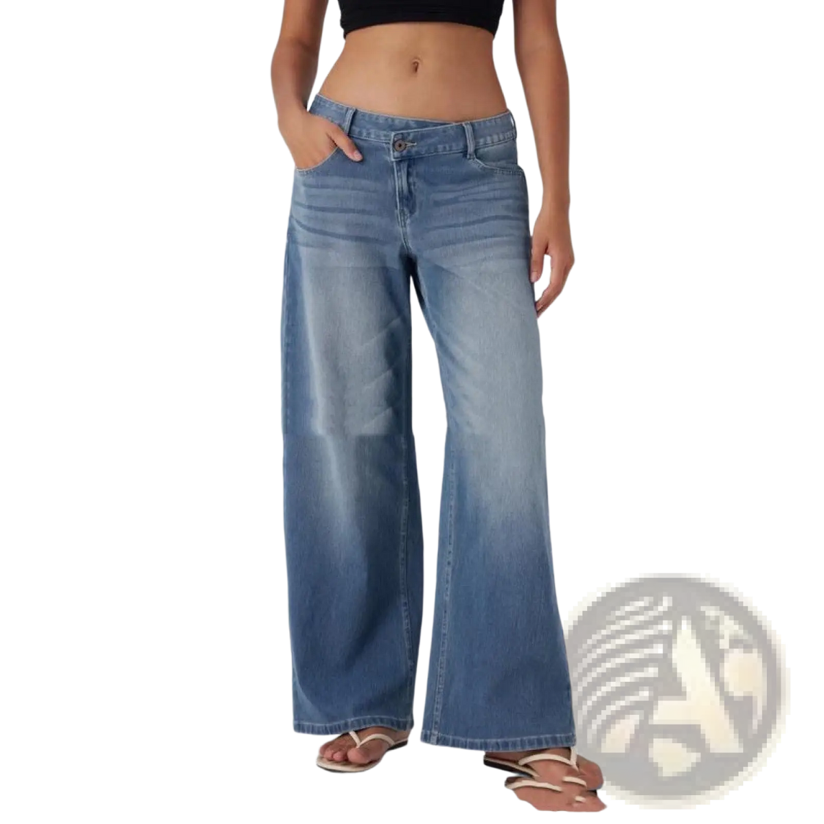 Low waist wide leg jeans in medium-wash blue denim with subtle fading and distressing details