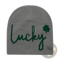 Gray knitted beanie with lucky in dark green cursive and small shamrock embroidery for winter warmth
