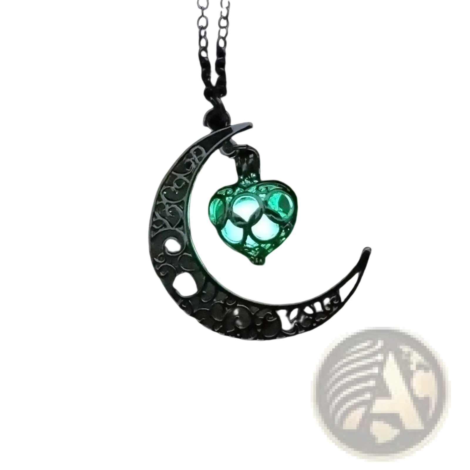 A silver crescent moon pendant with intricate filigree design cradling a glowing green heart shaped lantern