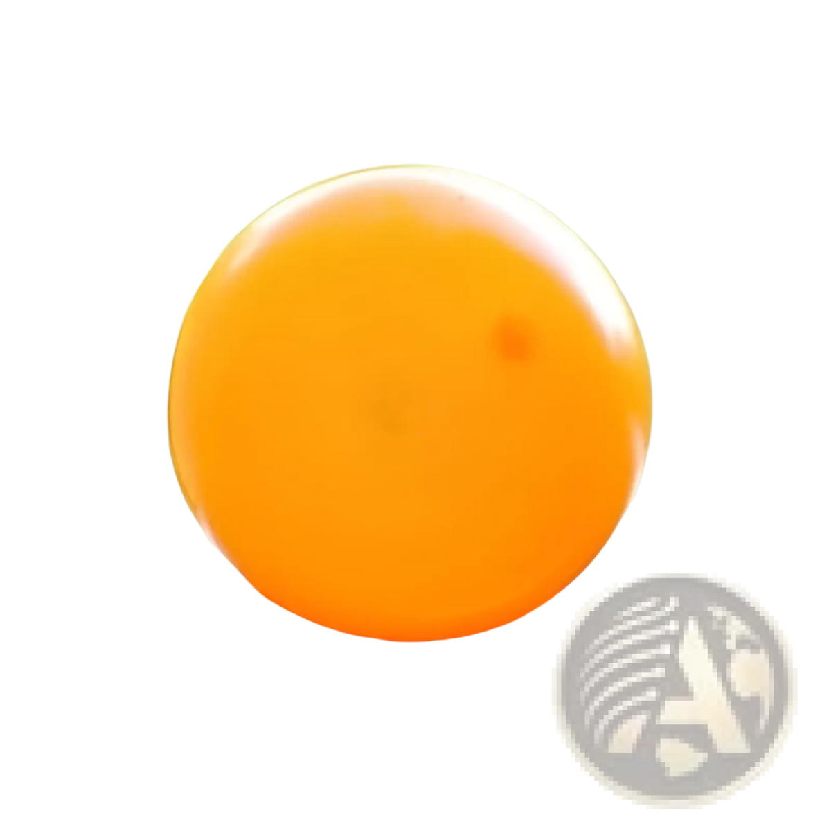 Bright orange luminous sticky wall ball glow in the dark squeeze toy resting on a metallic surface
