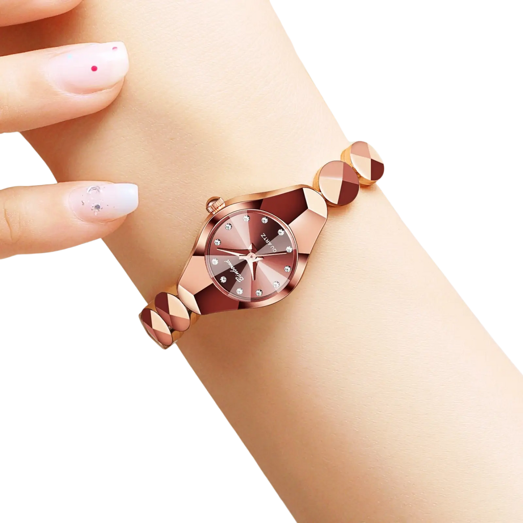 Luxe geometric faceted bracelet watch in rose gold with diamond-accented dial and matching metal chain strap
