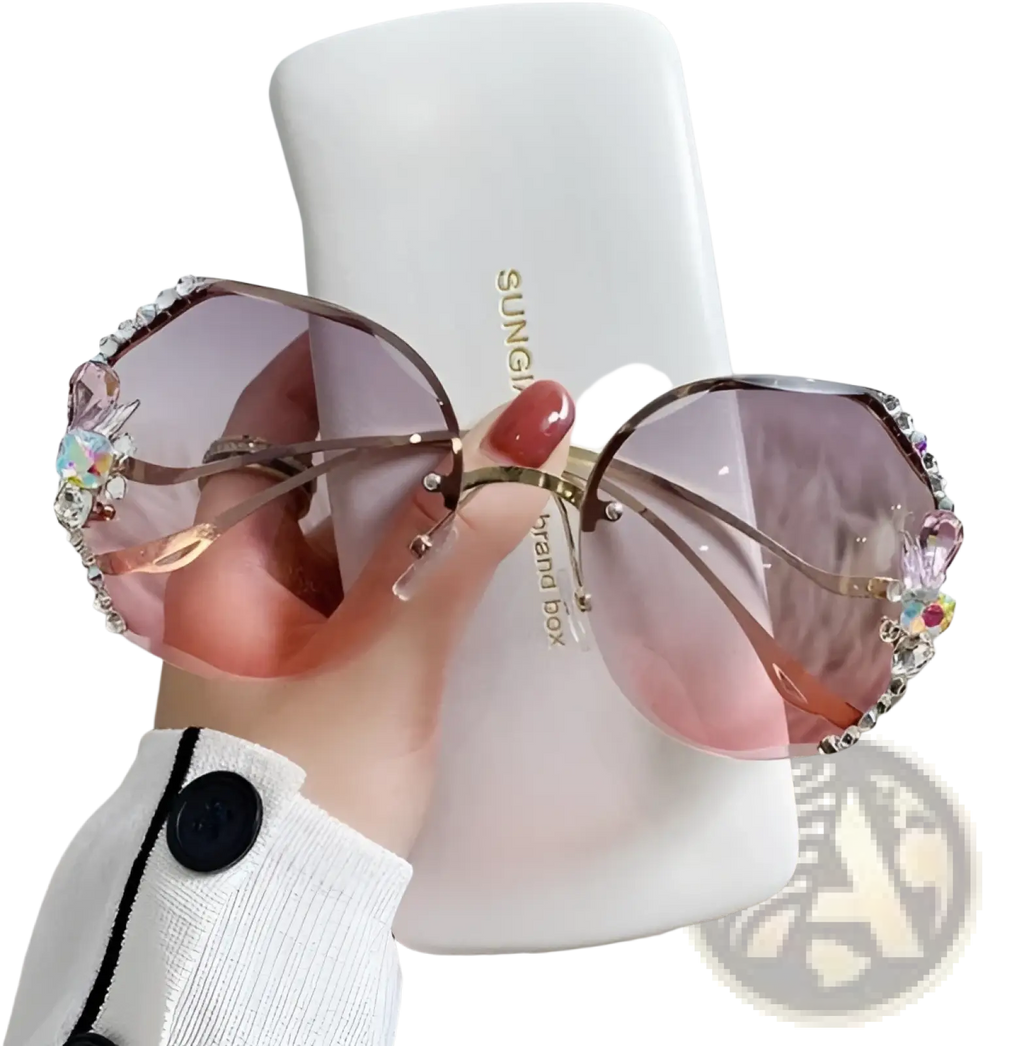 Luxury crystal butterfly rhinestone uv400 sunglasses with pink gradient lenses and crystal embellished frames held by white case