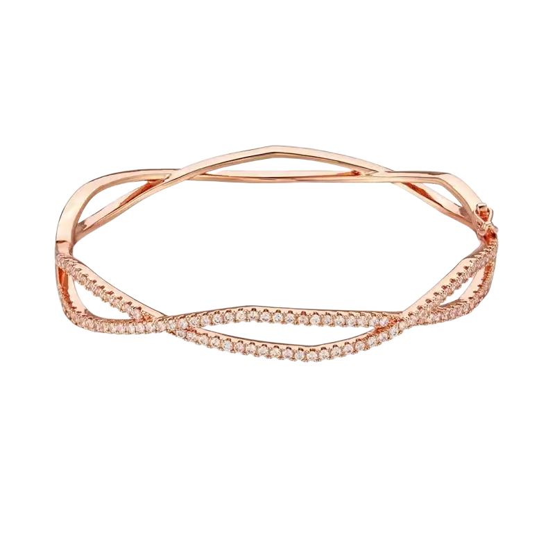 Luxury gold plated rose gold twisted bangle bracelet adorned with sparkling pavé cubic zirconia diamonds