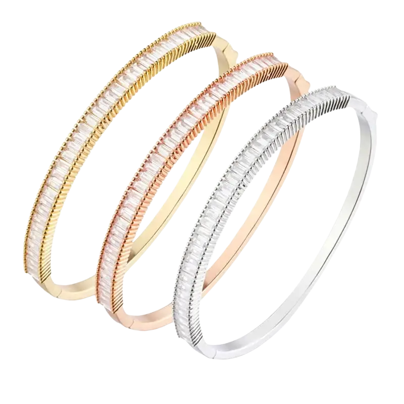 Three elegant luxury gold plated bangle bracelets in gold, rose gold, and silver with cubic zirconia crystals