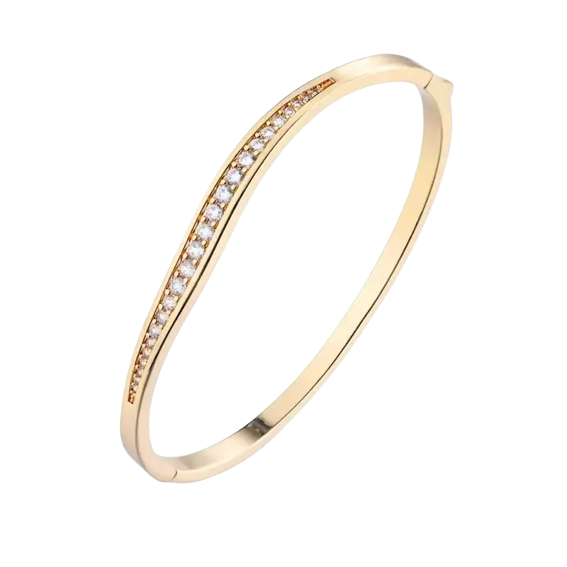 Luxury gold plated bangle bracelet with a gold plated finish and a single row of clear cubic zirconia stones