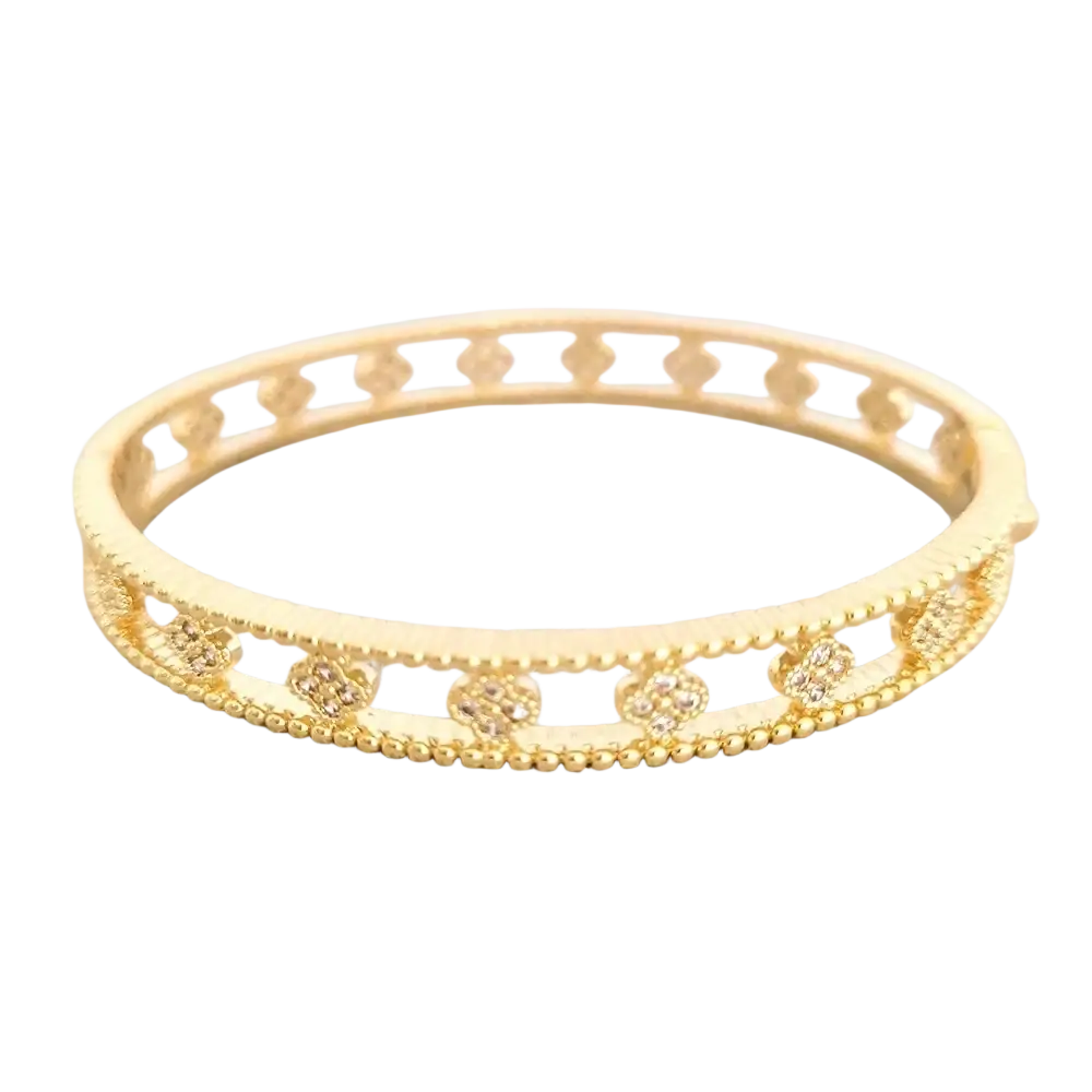 Luxury gold plated bangle bracelet featuring gold tones, intricate diamond cubic zirconia clover motifs, and beaded edge design