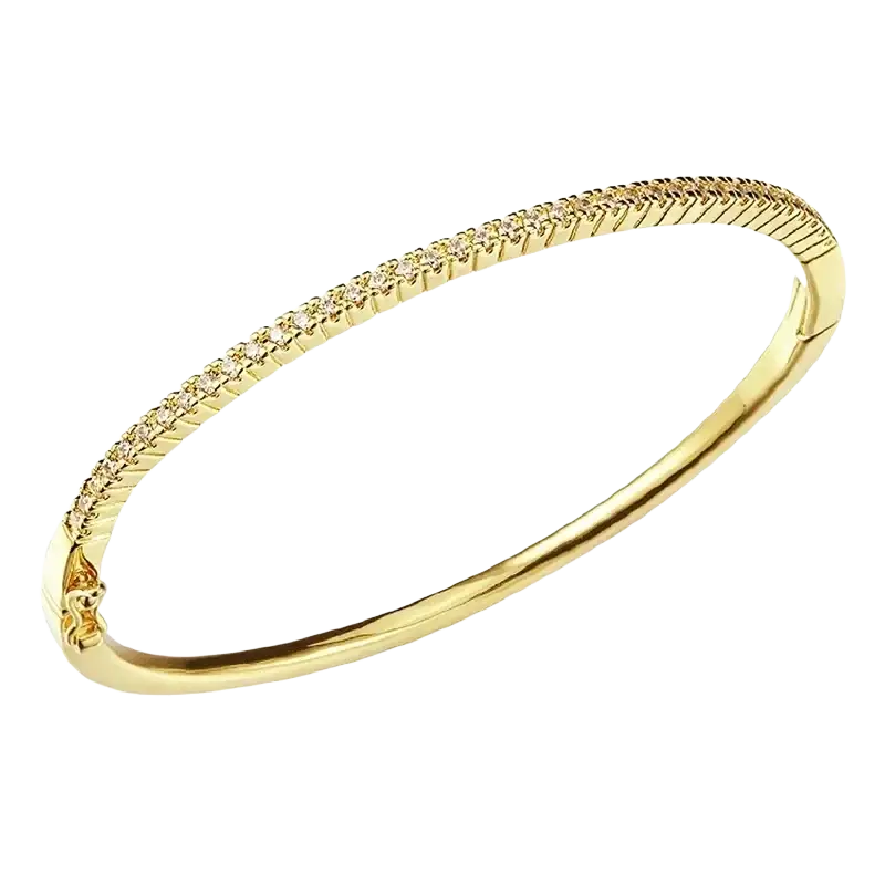 Luxury gold plated bangle bracelet featuring a textured rope pattern and sparkling cubic zirconia accents along the inner edge