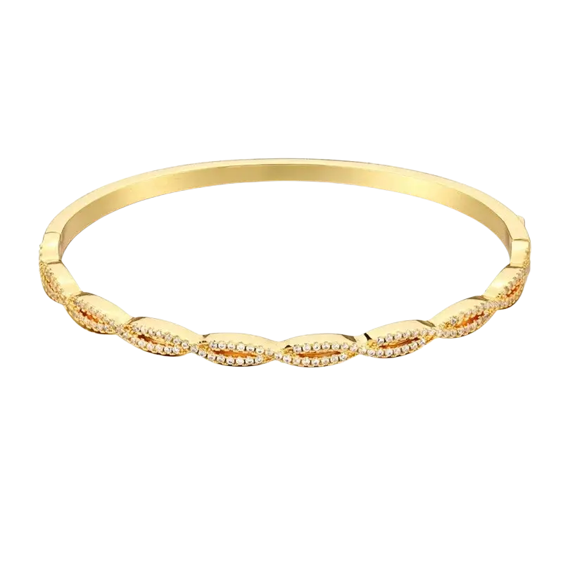 Luxury gold plated gold toned bangle bracelet with twisted design and embedded clear cubic zirconia crystals
