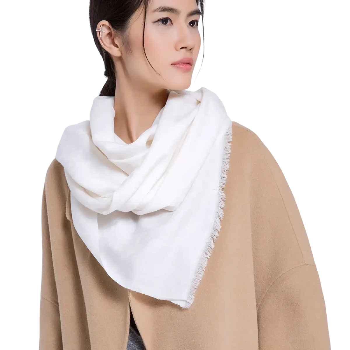 Luxury wool scarf for women in white with frayed edges draped around the neck