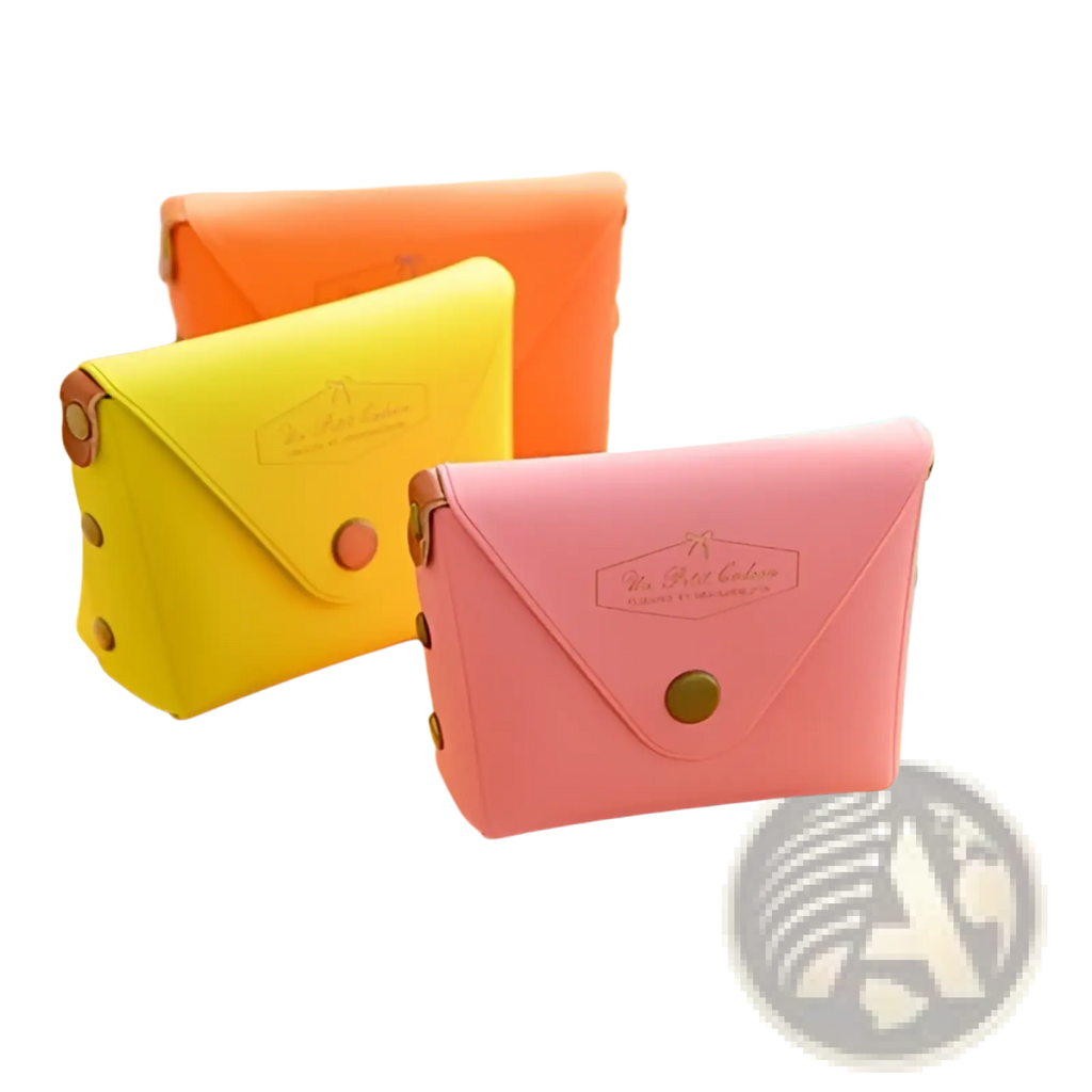 Pink leather coin purse with gold-tone button closure and embossed logo from macaron pastel leather and pvc set