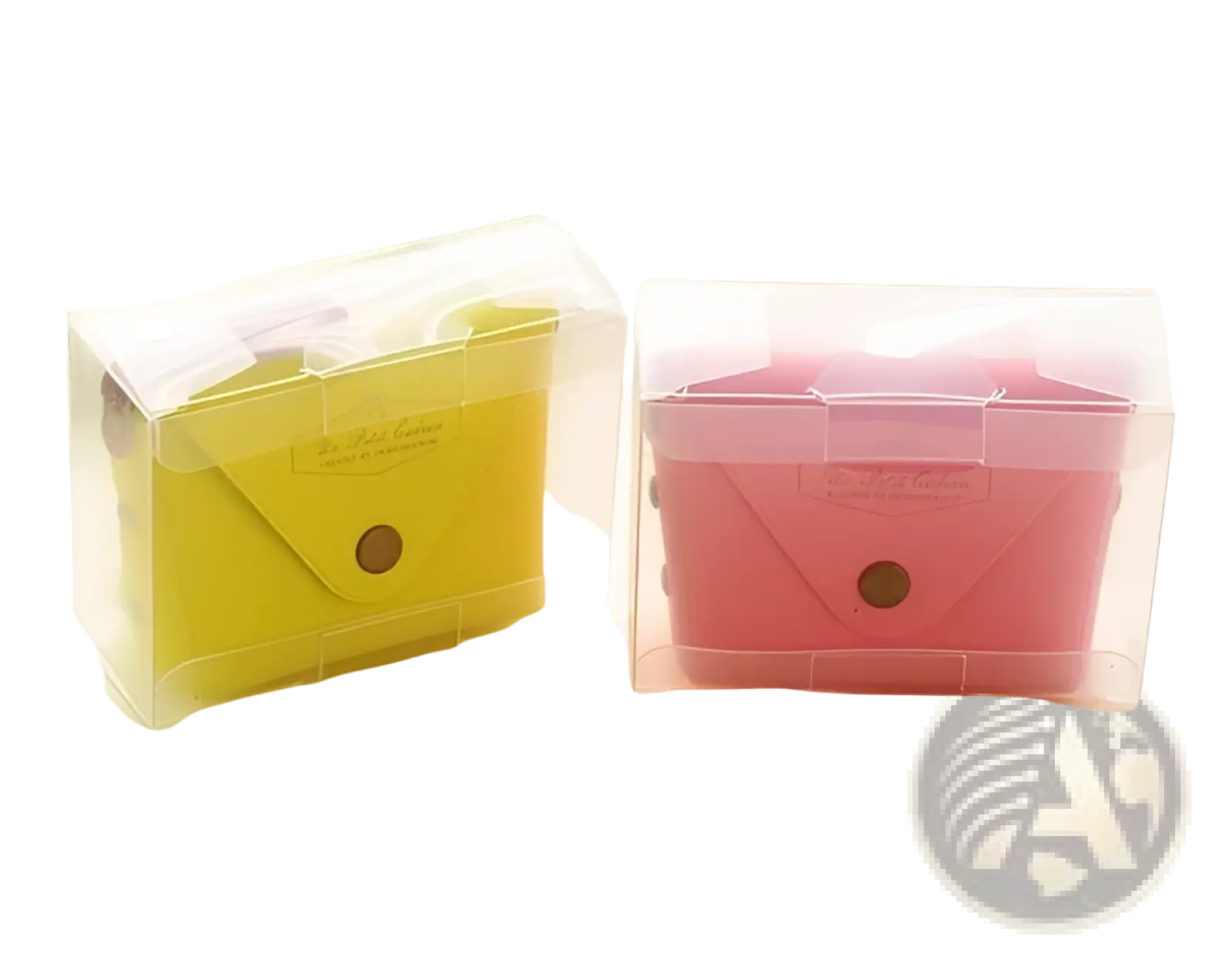 Two translucent plastic coin purses in yellow and pink with white leather flaps and brown button closures