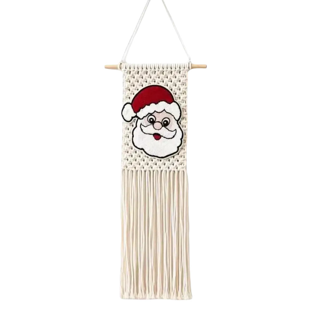 Cream-colored macrame Christmas wall hanging tapestry featuring an embroidered Santa Claus face with red hat and white beard