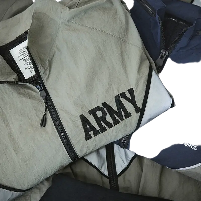 Light gray Maden men vintage windbreaker with bold black army lettering and black zipper trim for skin clothing use