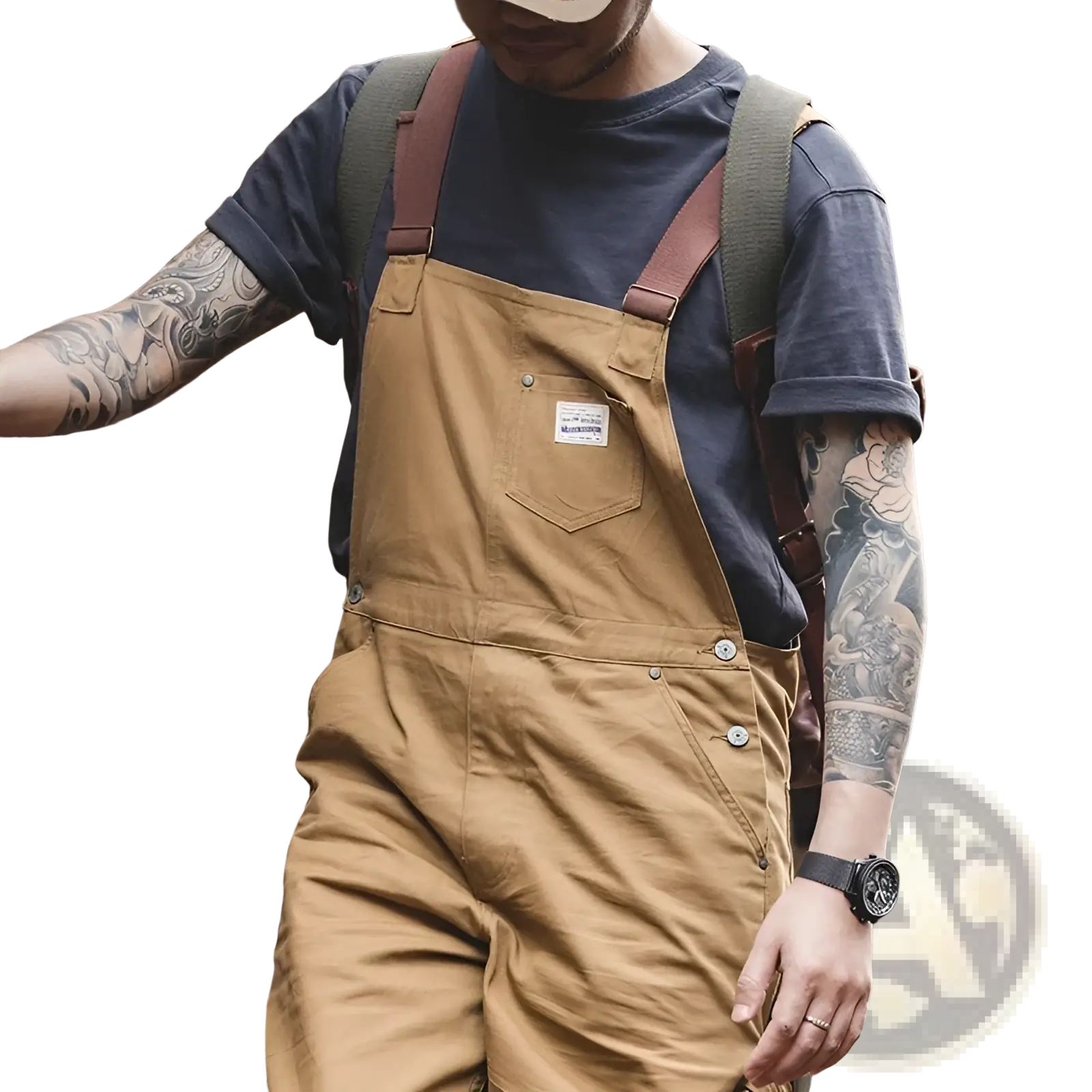 Maden vintage tan canvas workwear overalls made of cotton with brown leather straps and a white label on the chest pocket