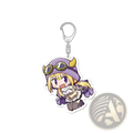 A purple and gold-accented chibi acrylic keychain featuring a blonde character in aviator goggles from Madoka Magica