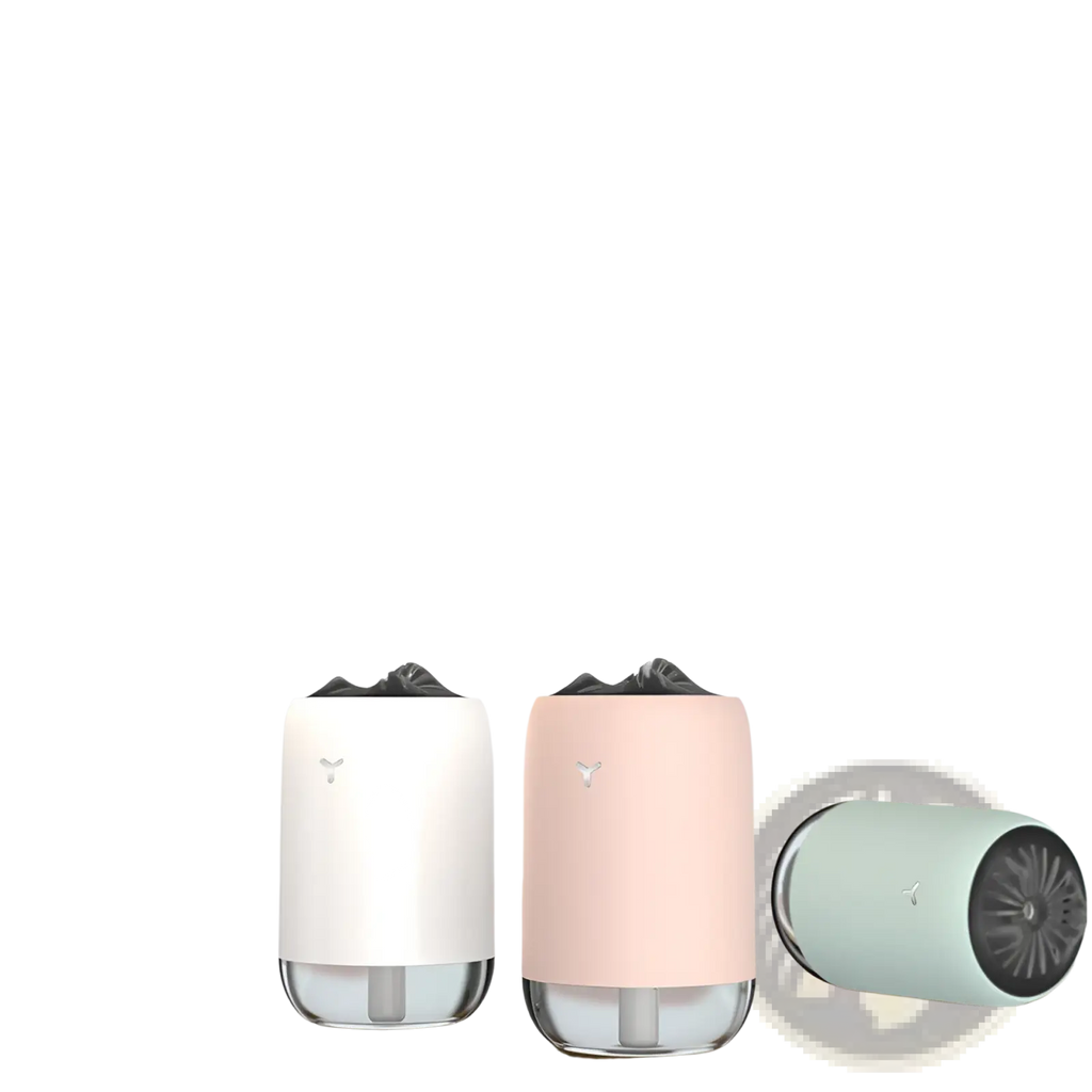 Two sleek cylindrical Magic Flame humidifier mini usb ultrasonic aroma diffusers in white and blush pink glass emit mist