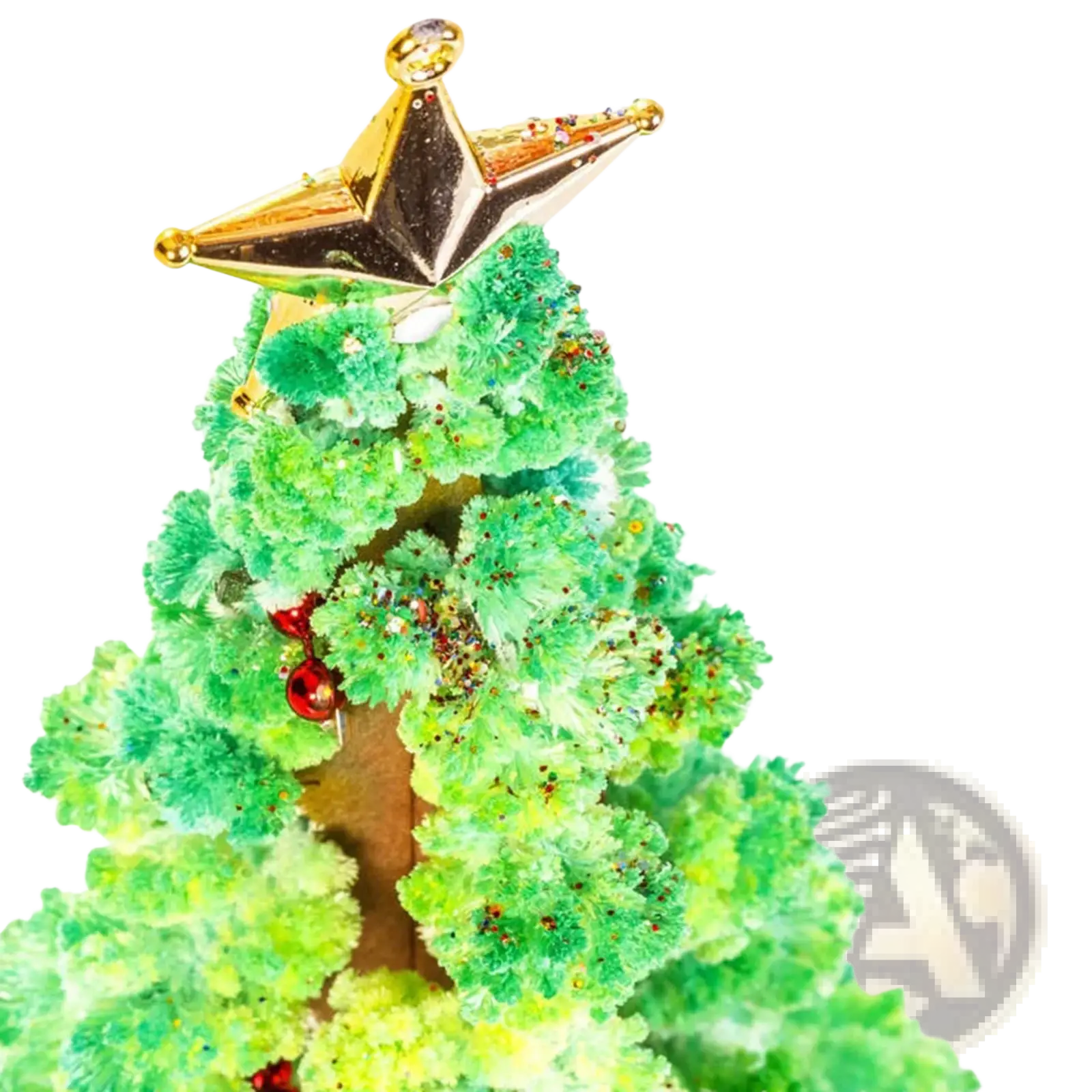 A festive green crystalline magic growing christmas tree tabletop toy with a gold star topper and red ornaments