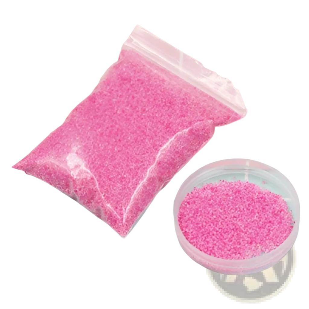 Pink glitter hydrophobic magic sand in clear bag with matching pink container for kids diy waterproof toy
