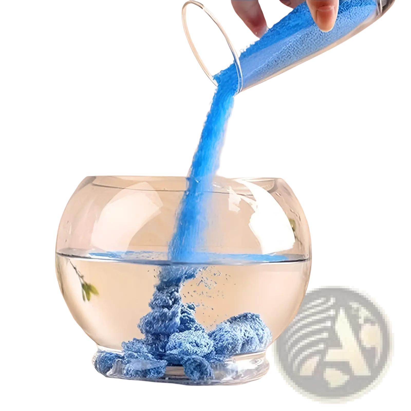 Blue glittery hydrophobic magic sand being poured into a clear glass bowl of water for waterproof diy kids toy