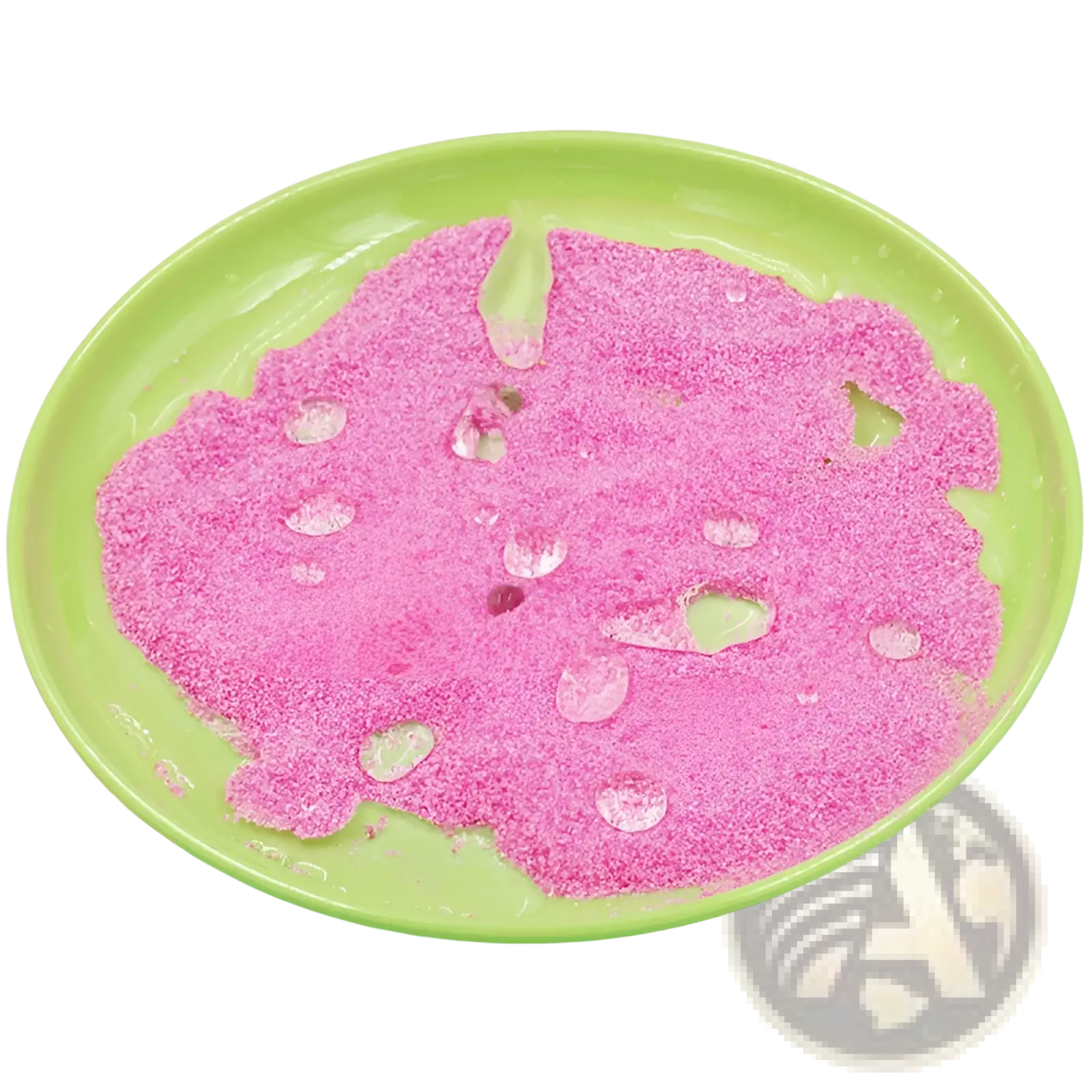 Pink glittery magic sand hydrophobic waterproof diy toy for kids in a green plastic bowl with water droplets on surface