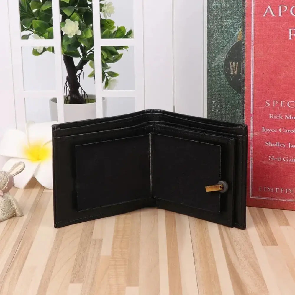 Magic Blaze minimalist leather fire wallet in black with a small gold lock on the right side