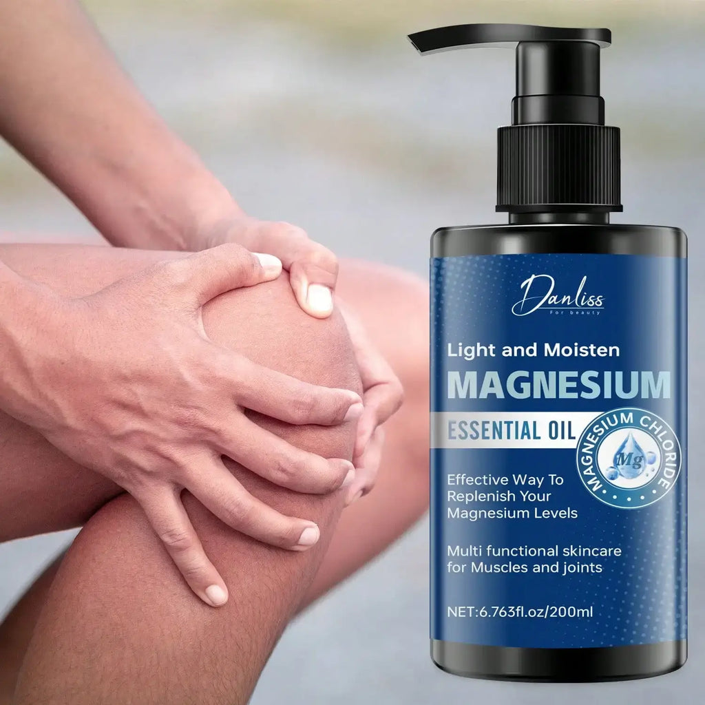 Daniss magnesium essential oil in a sleek black pump bottle with blue label enhances skin softness and muscle care