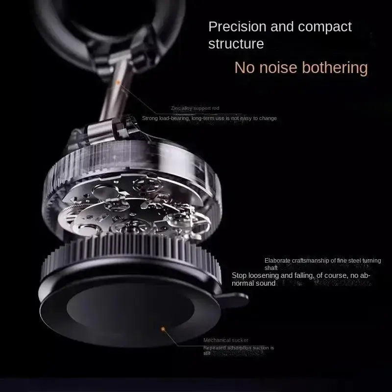 Silver-toned mechanical watch movement with intricate gears and zinc alloy support rod shown behind magnetic car phone mount 360 holder