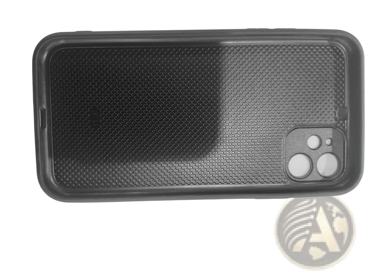 Black textured magnetic carbon fiber phone case with raised edges and camera cutout shown from the back side