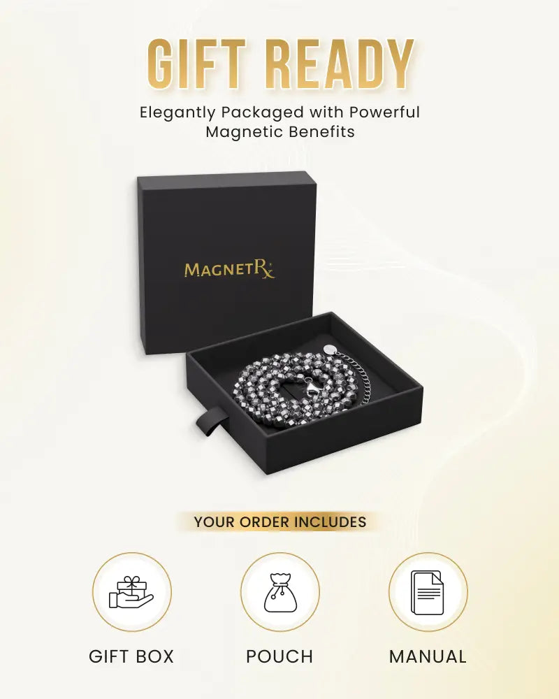 A faceted magnetic hematite 6mm beaded necklace with silver toned spherical beads in an elegant black gift box