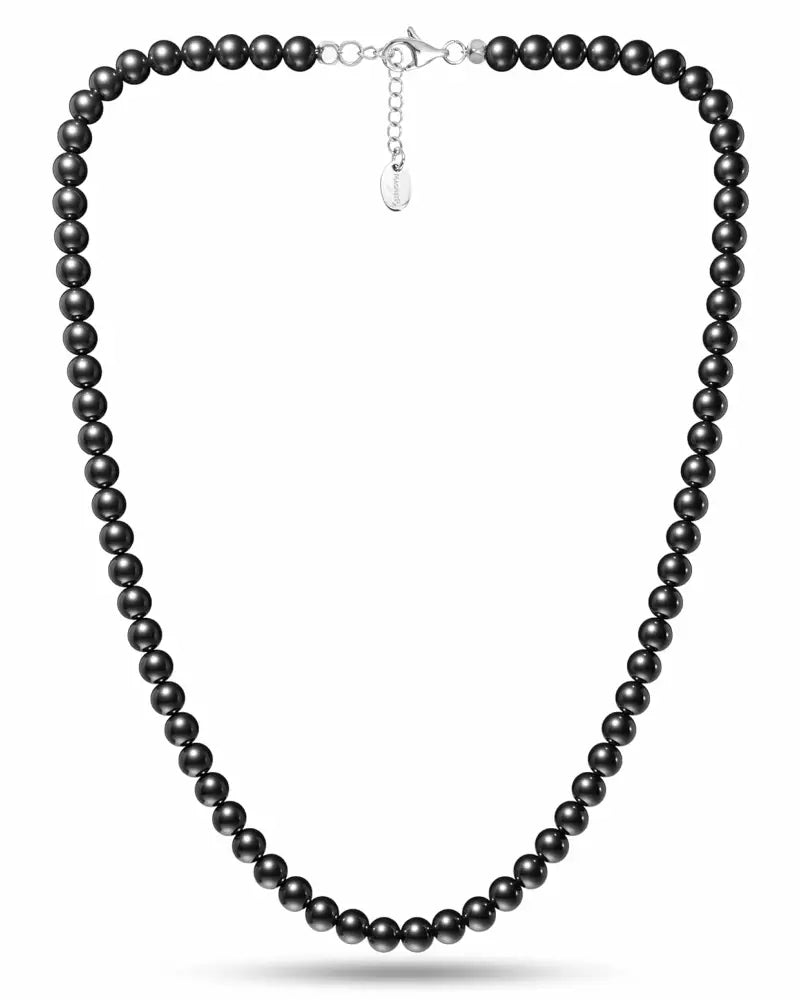 A sleek black polished 6mm magnetic hematite round bead necklace with a silver-toned clasp and chain