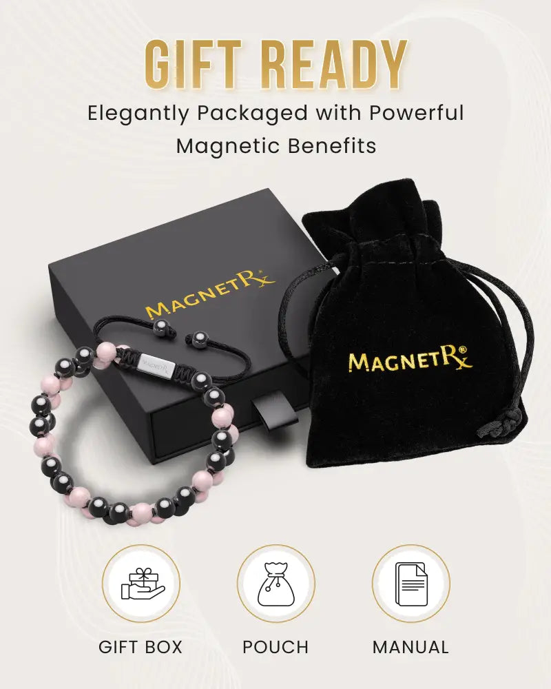 Rose quartz and magnetic hematite beaded bracelet in black and pink with silver clasp in elegant black gift packaging