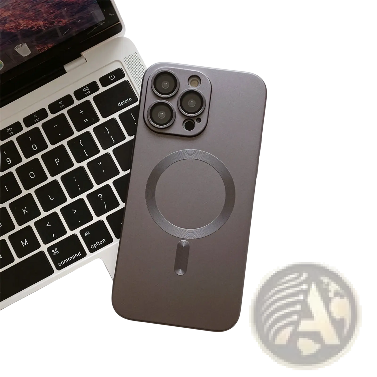 A sleek matte gray magnetic phone case with lens protector and circular charging pad shown from the back side