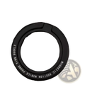 Black magnetic phone ring holder for Magsafe with circular design and engraved text on the back side