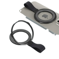 Black magnetic phone ring holder with sleek minimalist design and soft orange silicone strap for MagSafe use