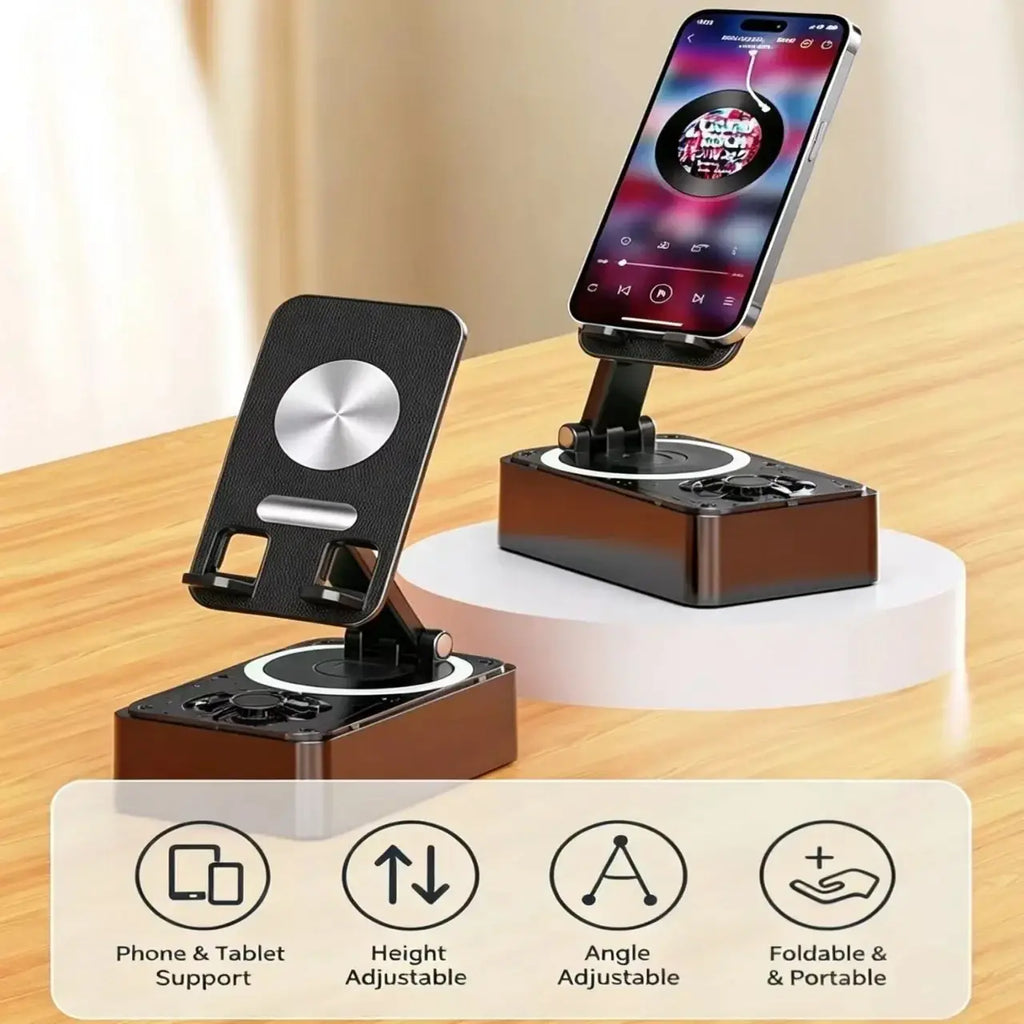 Black and silver magnetic phone stand with bluetooth speaker and power bank featuring adjustable height and angle for tablets and smartphones