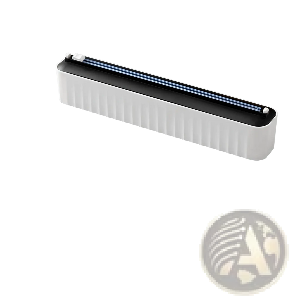 White plastic food vacuum sealer with black top and blue sealing strip in magnetic plastic film cutter and wrap dispenser