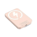 A sleek blush pink magnetic power bank 20000mah fast charging pad with minimalist white lightning bolt logo and rounded edges