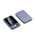 A sleek dark gray magnetic power bank 20000mah with built-in digital display and fast charging pad