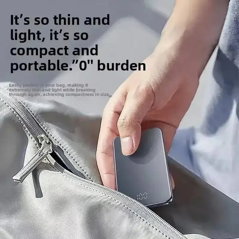 A sleek slim black magnetic power bank with metallic edges and 20000mah quick charge capability