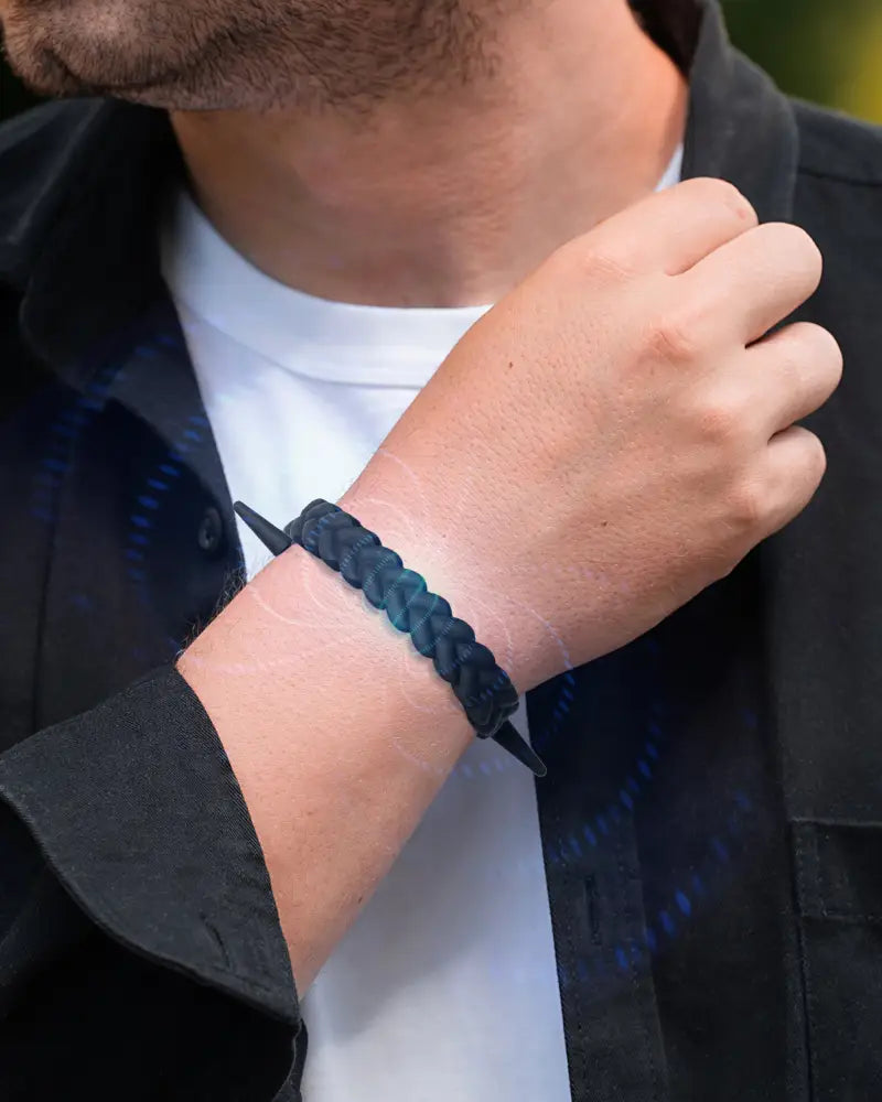 Dark blue braided silicone magnetic golf bracelet with black spike accents by magnetrx