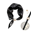 Black silk magnetic stripe scarf with white paisley pattern and a central pearl accent for elegant wear