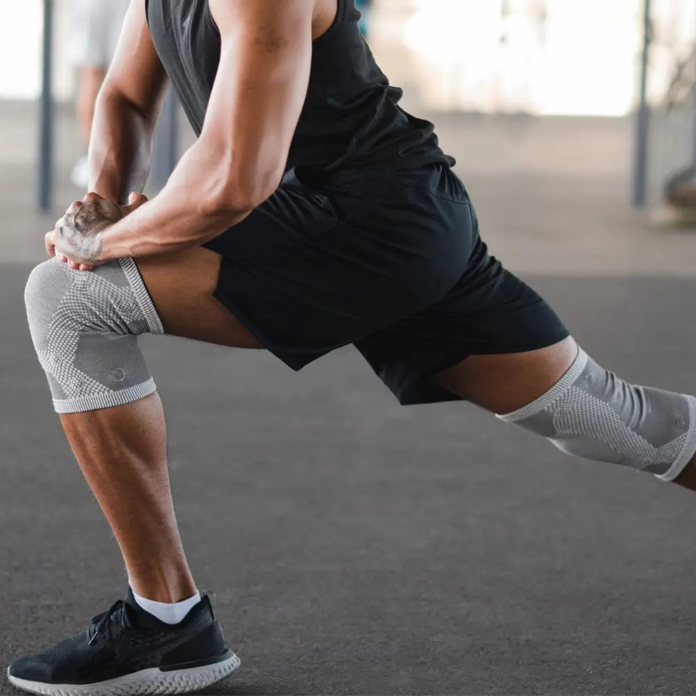 Gray magnetic therapy 3d knitted knee compression sleeves pair with mesh and reinforced panel design for athletic support