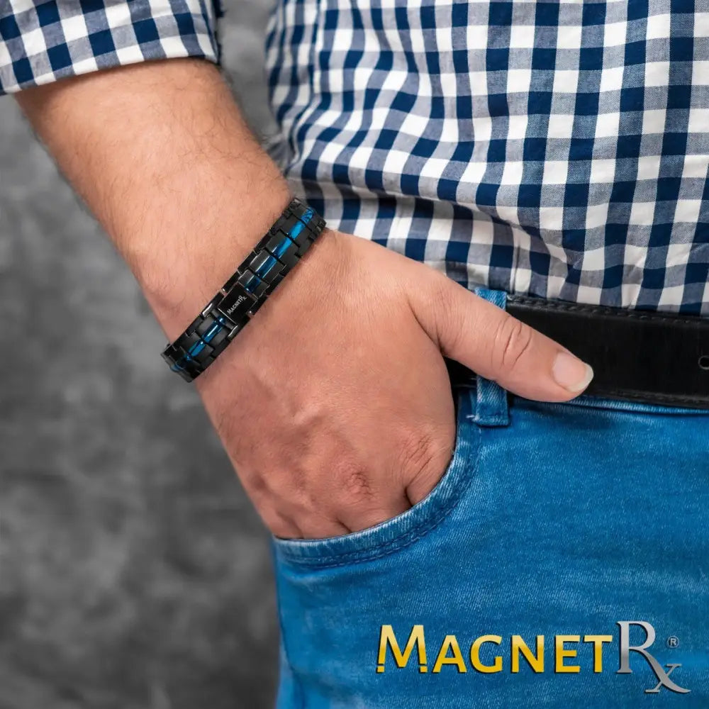 Mens titanium magnetic thin blue line bracelet in black and blue with a sleek segmented design