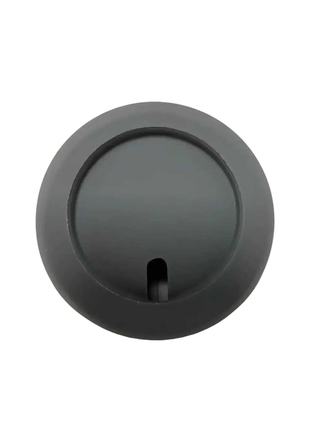 Matte gray circular button with central slot on the back of a magnetic wireless phone charging stand for iphone