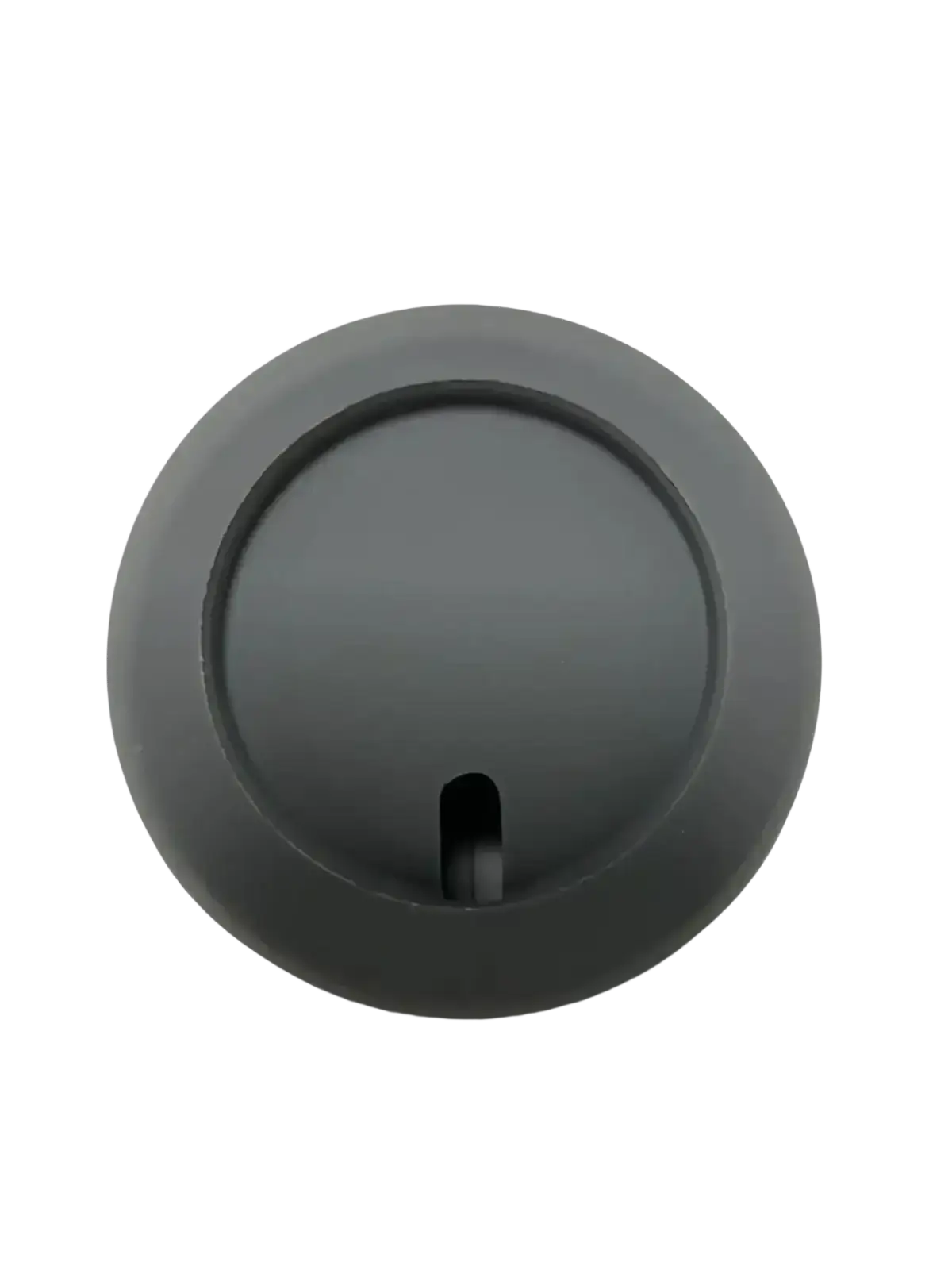 Matte gray circular button with central slot on the back of a magnetic wireless phone charging stand for iphone