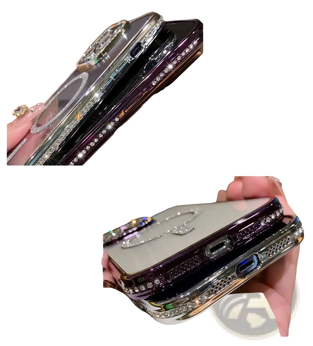 View of the back side of a magsafe rhinestone phone case for iphone 13 pro max in silver and black with magnetic ring holder