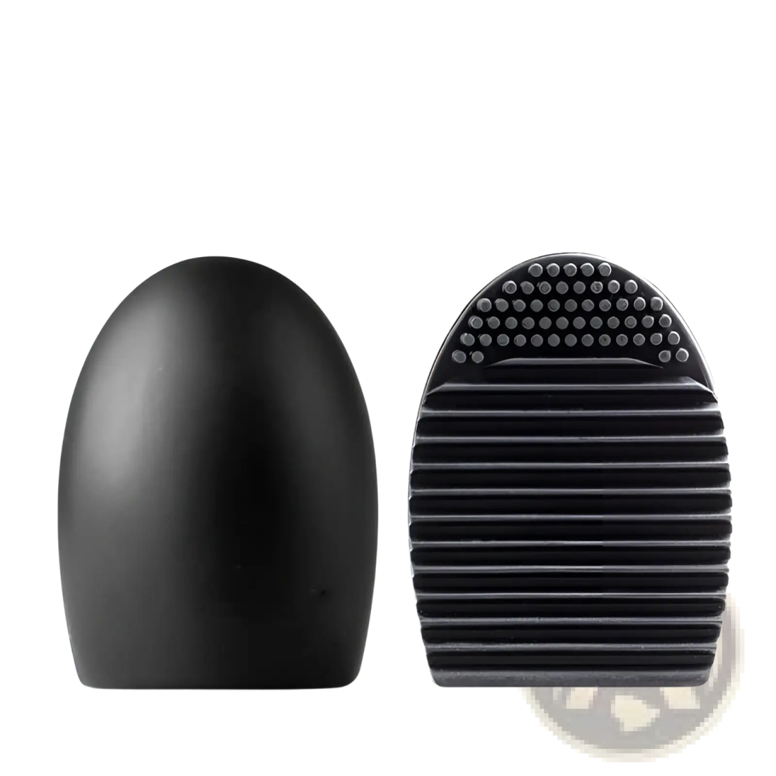 Black silicone eyelash brush with textured bristles and smooth rounded handle for makeup brush cleaner silicone egg tool