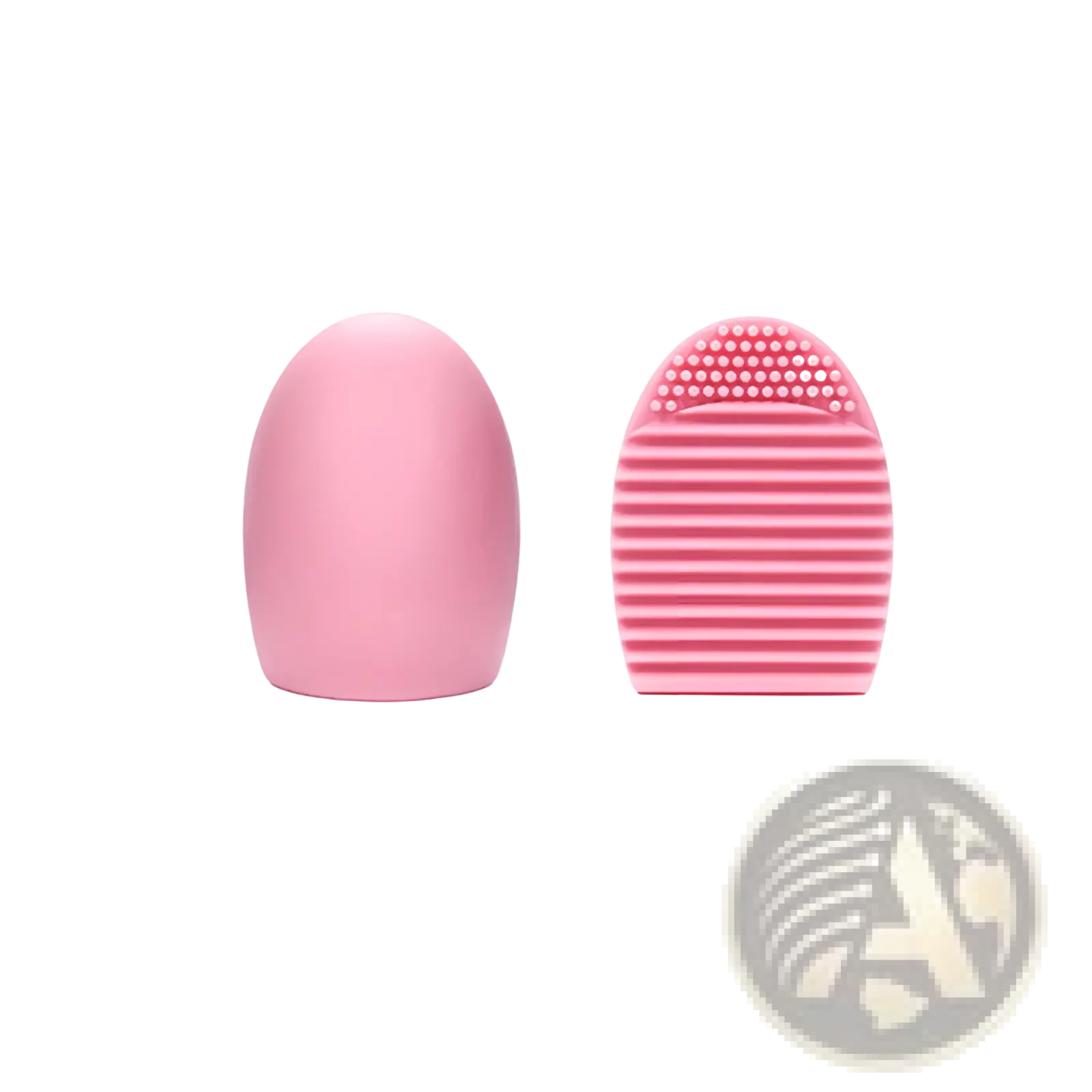 Pink silicone makeup brush cleaner egg scrubbing tool with smooth rounded body and textured bristle side for gentle application