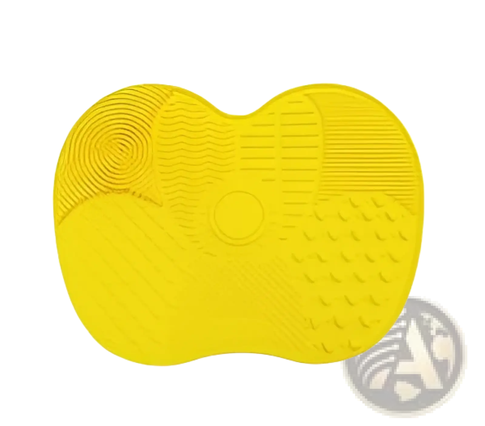 Bright yellow heart shaped silicone makeup brush cleaning mat with textured patterns and central circular indentation